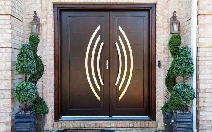 A wide double entrance door on a contemporary house