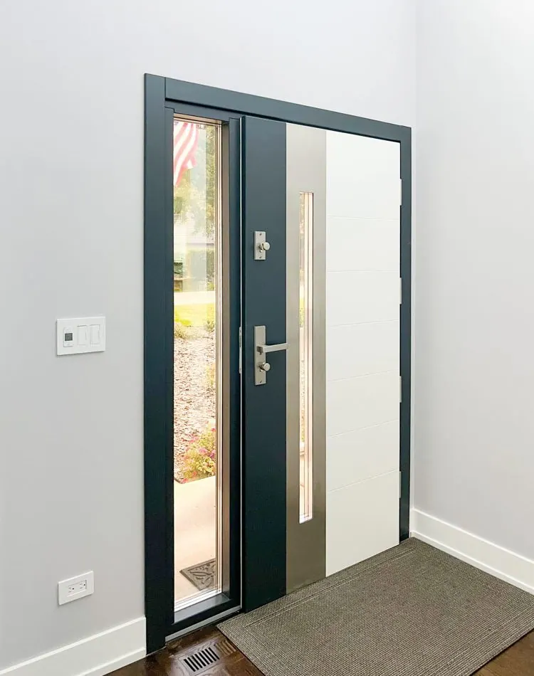 Front door of a house with single sidelight incorporated with glass.