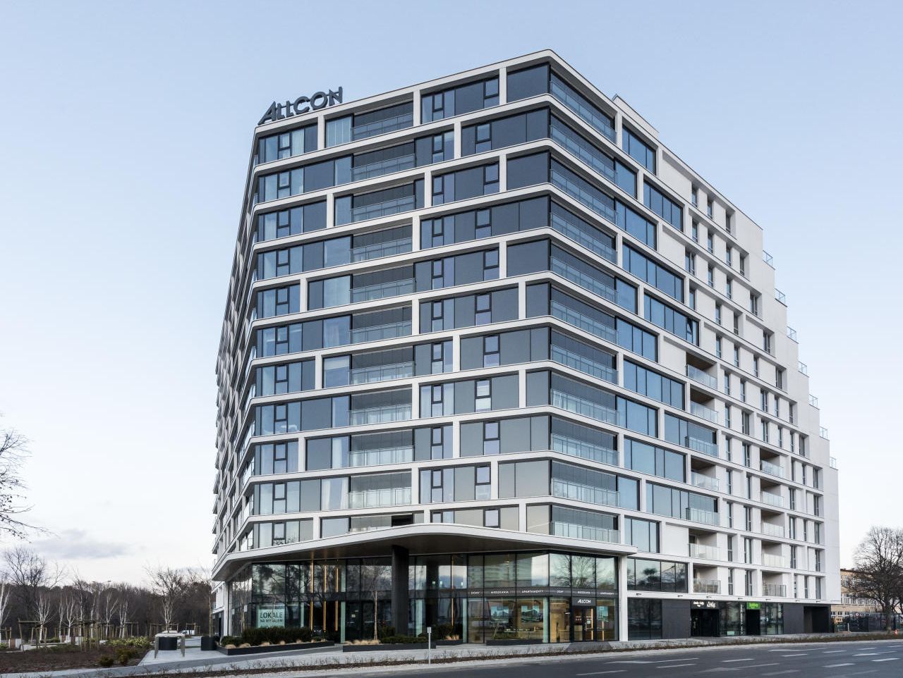 A residential building with combination windows, and stationary glass windows