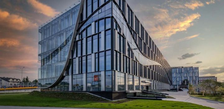 A modern building designed with glass all over for the windows and doors